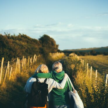 Children+walking+over+meadow+in+Ukraine